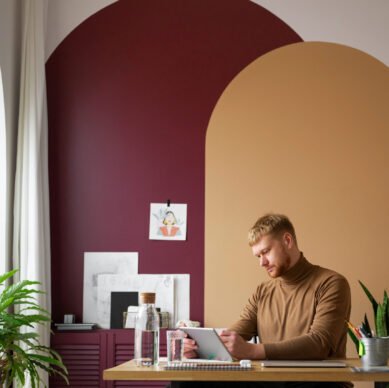 adult-male-illustrator-working-tablet-device