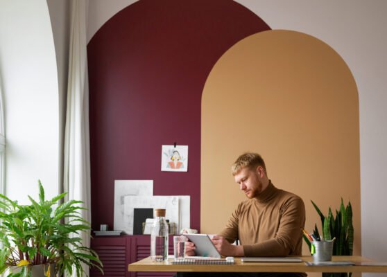 adult-male-illustrator-working-tablet-device